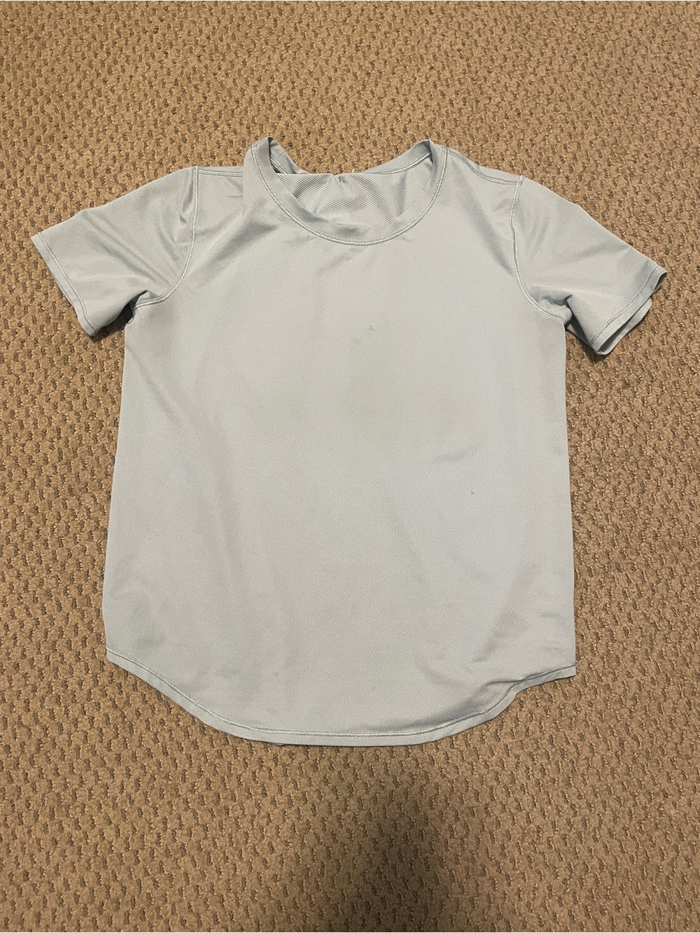 Lululemon size 4 women’s light teal athletic t shirt